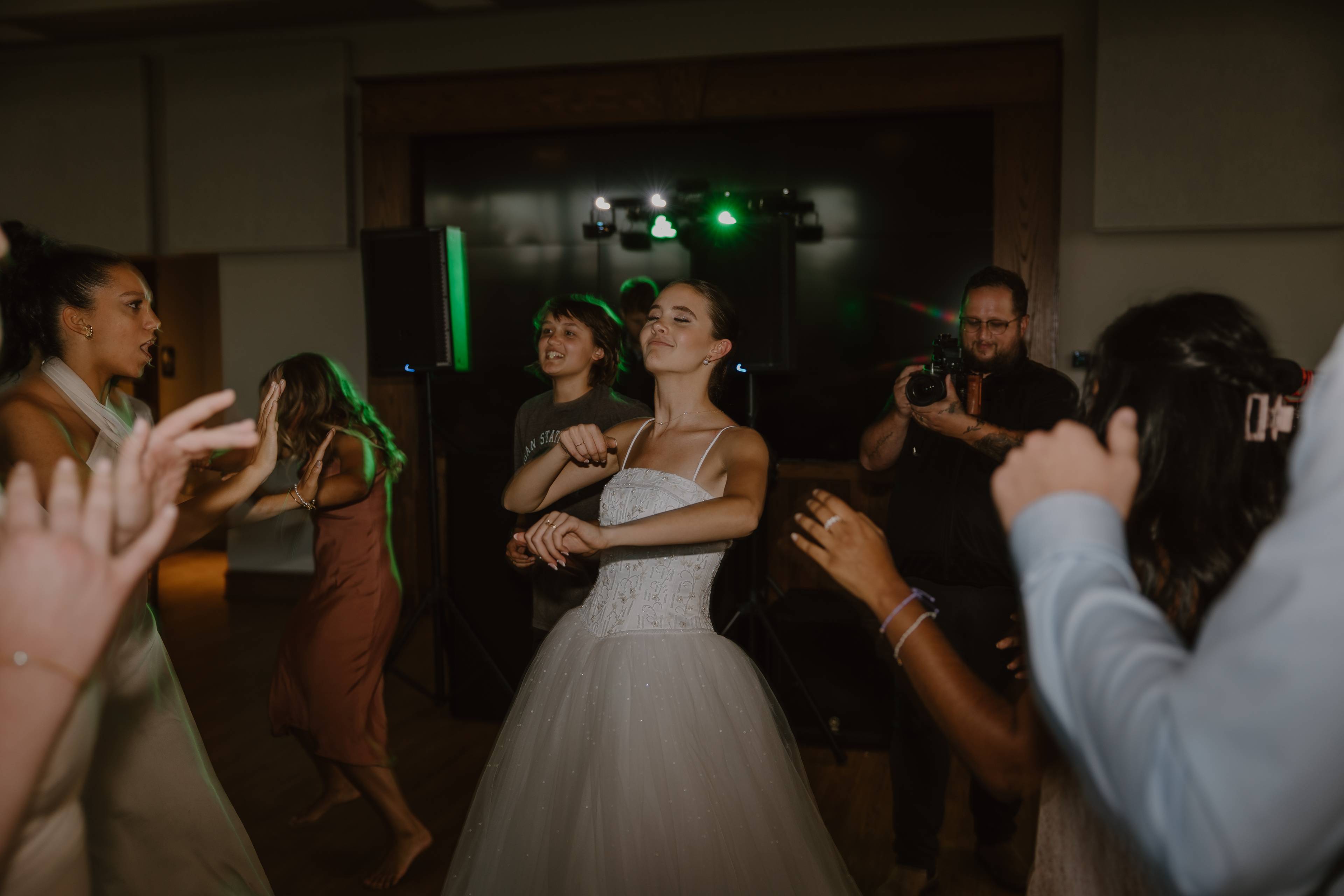 A bride happily grooving to the music.